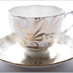 white and gold teacup